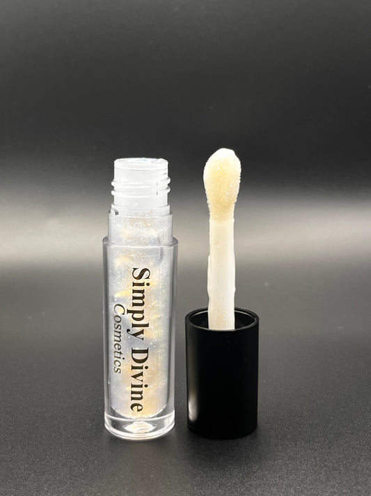 Sarah blue sparkle lip gloss swatch - vegan cruelty-free shimmering formula with nourishing oils"