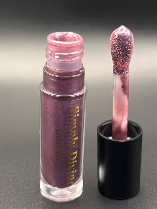 Leah deep purple lip gloss swatch - vegan cruelty-free color-changing formula with nourishing oils"